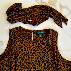 Beautiful tiger print dress with sash. Catch everyone’s eye on the town